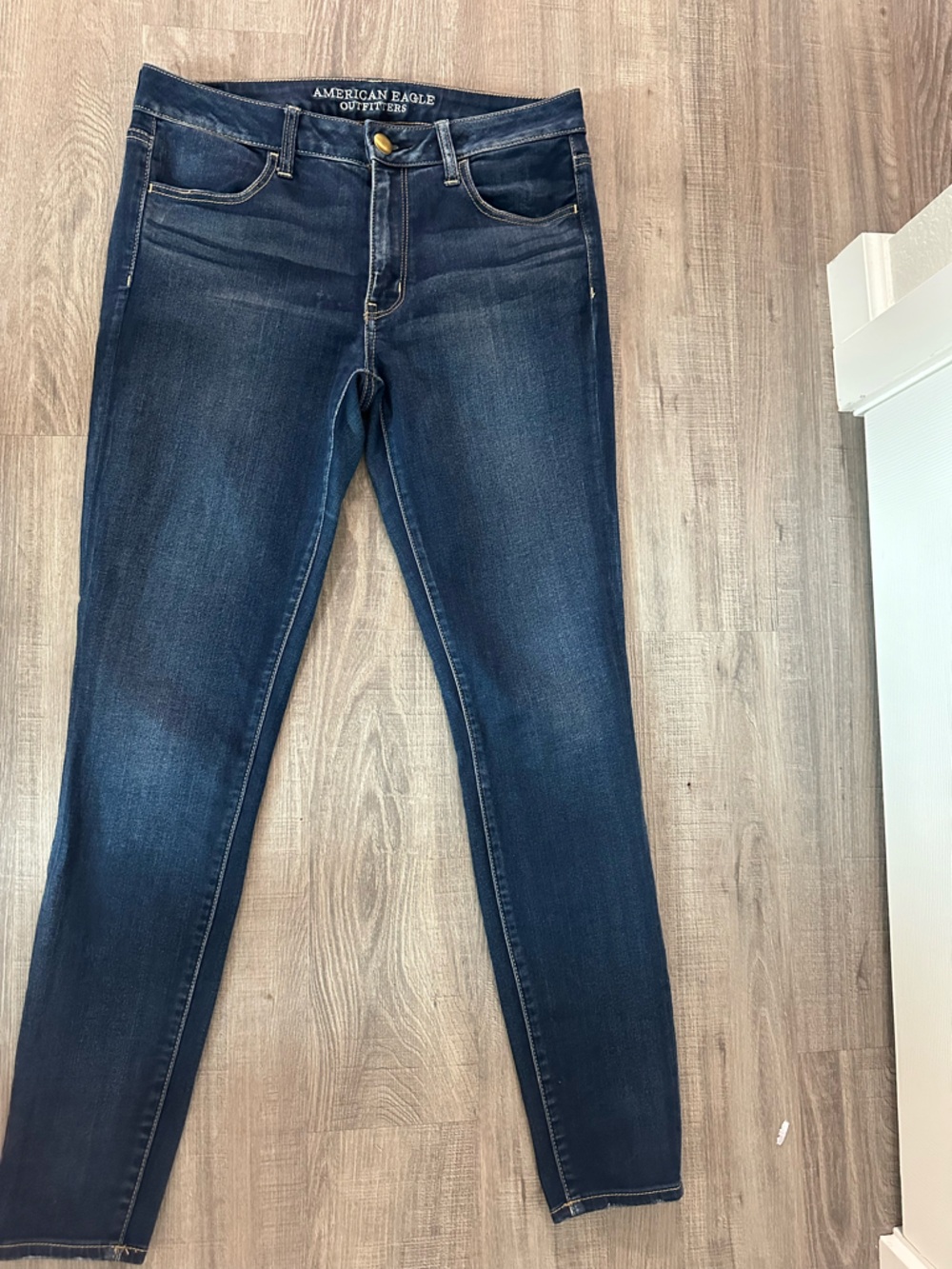 American Eagle Outfitters Dark Blue Denim Jeans with Tan Stitching